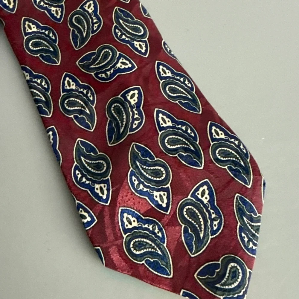 Manhattan Neck Tie necktie featuring a blue and white paisley pattern